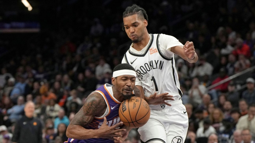 Suns' Bradley Beal limps off court late in loss to Nets 1 | ASL