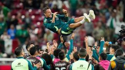 Mexico soccer manager Javier Aguirre struck by can thrown onto the pitch from stands, left with bloodied head 1 | ASL