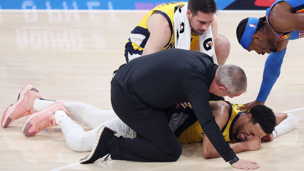 Pacers' Tyrese Haliburton exits Game 7 with right leg injury 1 | ASL