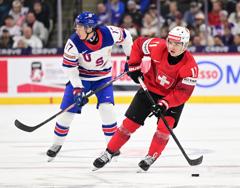 U.S. Downs Switzerland, 2-1, In World Juniors Prelims 24