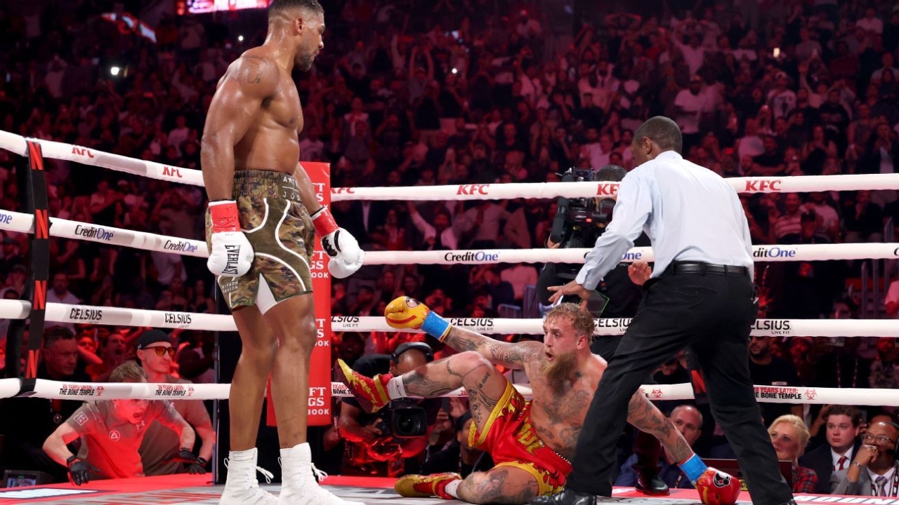 Anthony Joshua bides time, knocks out Jake Paul in sixth round 1