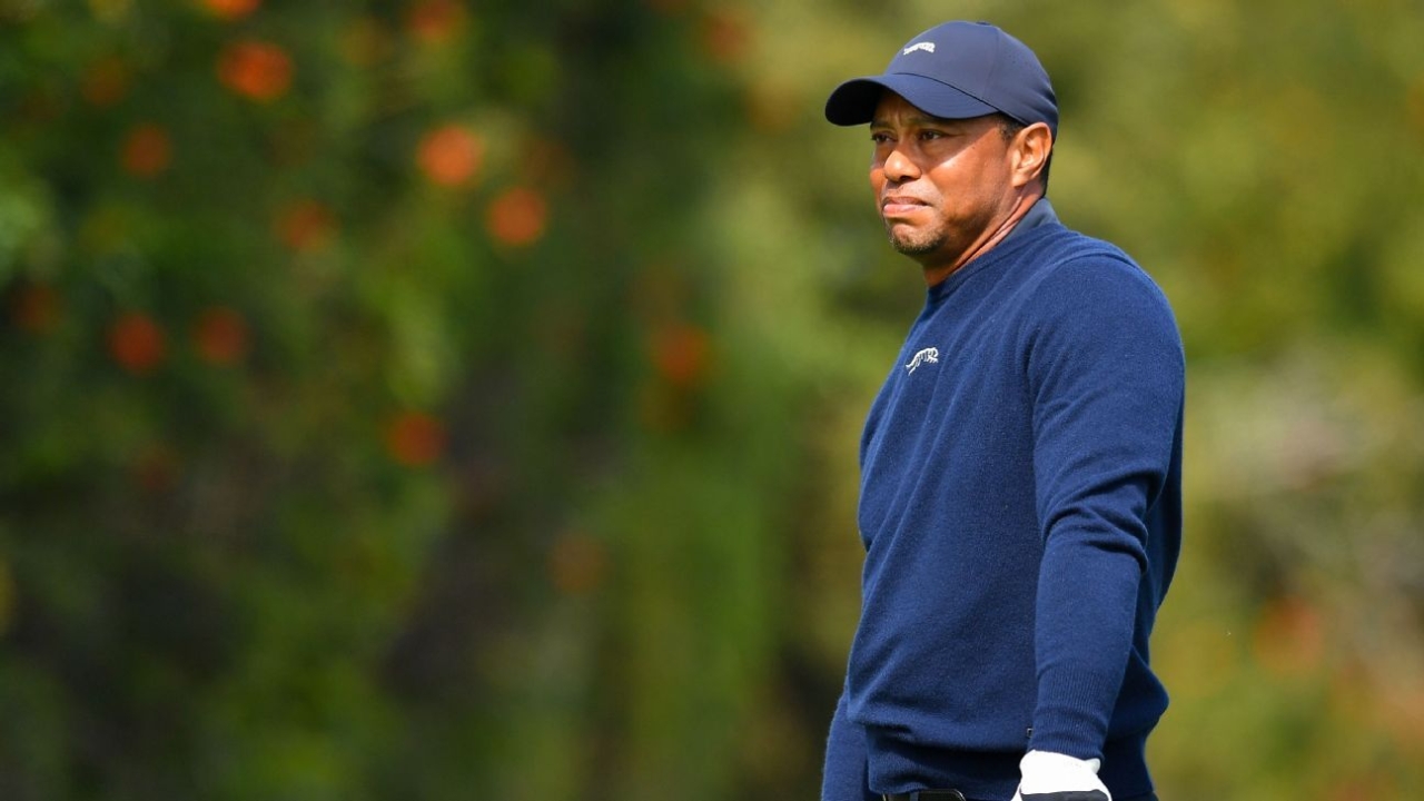 Tiger chipping, putting, says recovery from disc surgery 'slow' 1