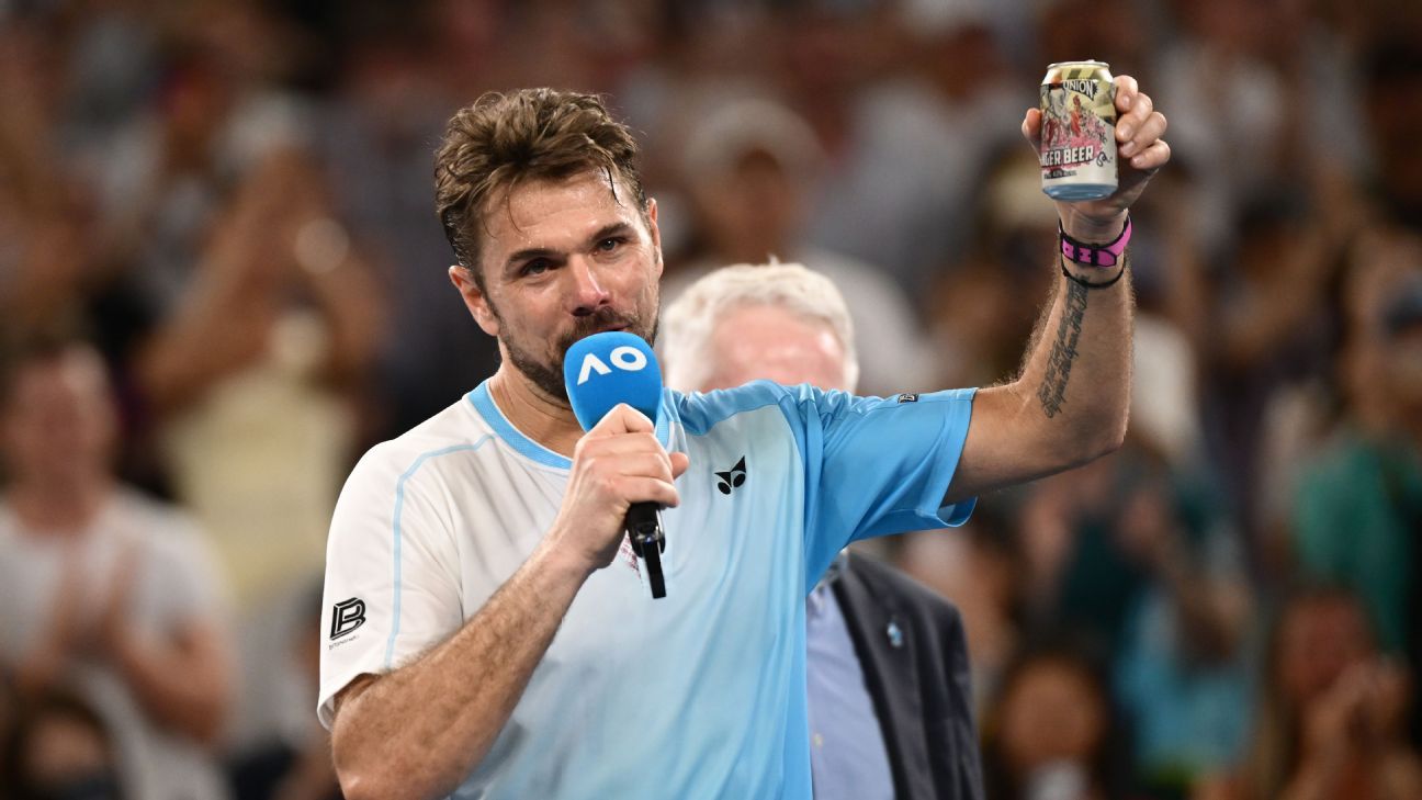 Stan Wawrinka celebrates with a beer following his farewell at the Australian Open. 1