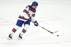 Team USA Advances to Olympic Gold-Medal Game With 6-2 Victory Over Slovakia Team USA Moves Forward to Olympic Gold Medal Match Following 6-2 Win Against Slovakia 26