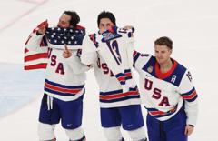 GOLDEN: U.S. Men Win Olympic Gold With 2-1 Overtime Victory Over Canada U.S. Men's Team Secures Olympic Gold After 2-1 Overtime Win Against Canada 28