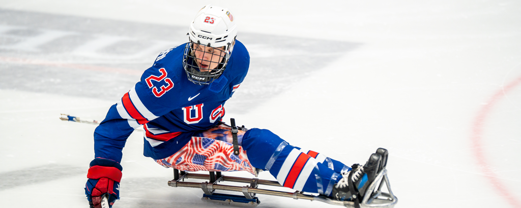 Although Liam Cunningham is the youngest member of the U.S. Paralympic Sled Hockey Team, he is welcomed as if he were an experienced player. 1