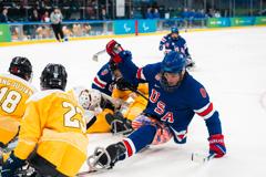 Team USA Overcomes China, 7-1, with Farmer Setting New Paralympic Points Record 32
