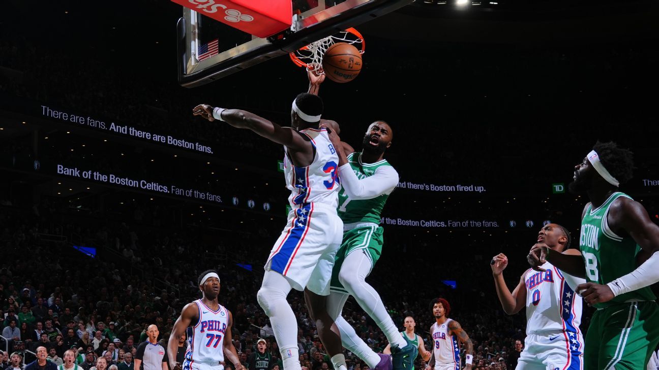 Jaylen Brown delivers a powerful dunk over Adem Bona in 76ers-Celtics matchup. 1