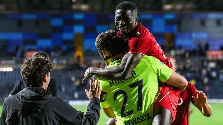 Aberdeen face disciplinary probe after fans invade pitch 5